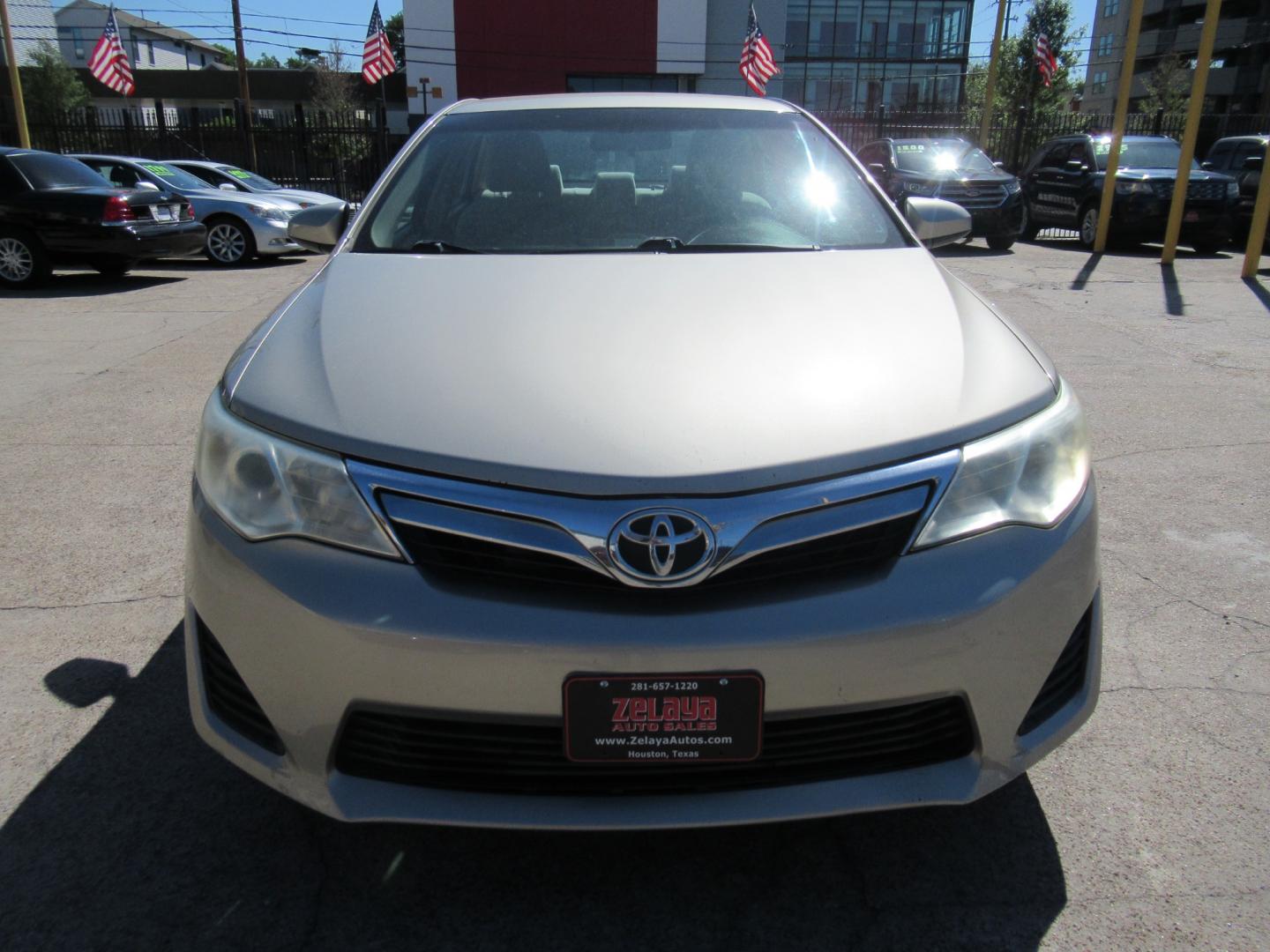 2014 /Tan Toyota Camry L (4T4BF1FK2ER) with an 2.5L L4 DOHC 16V engine, Automatic transmission, located at 1511 North Shepherd Dr., Houston, TX, 77008, (281) 657-1221, 29.798361, -95.412560 - 2014 TOYOTA CAMRY LE VIN: 4T4BF1FK2ER364962 4 T 4 B F 1 F K 2 E R 3 6 4 9 6 2 SEDAN 4 DR 2.5L I4 F DOHC 16V GASOLINE FRONT WHEEL DRIVE - Photo#20